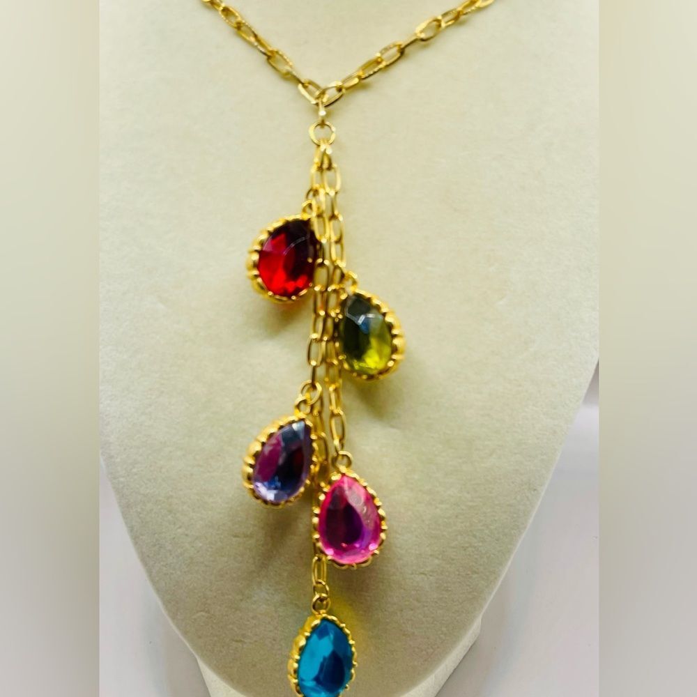 Cascading oval gemstones lariat necklace. Gold tone. 30 inches w/ the lariat